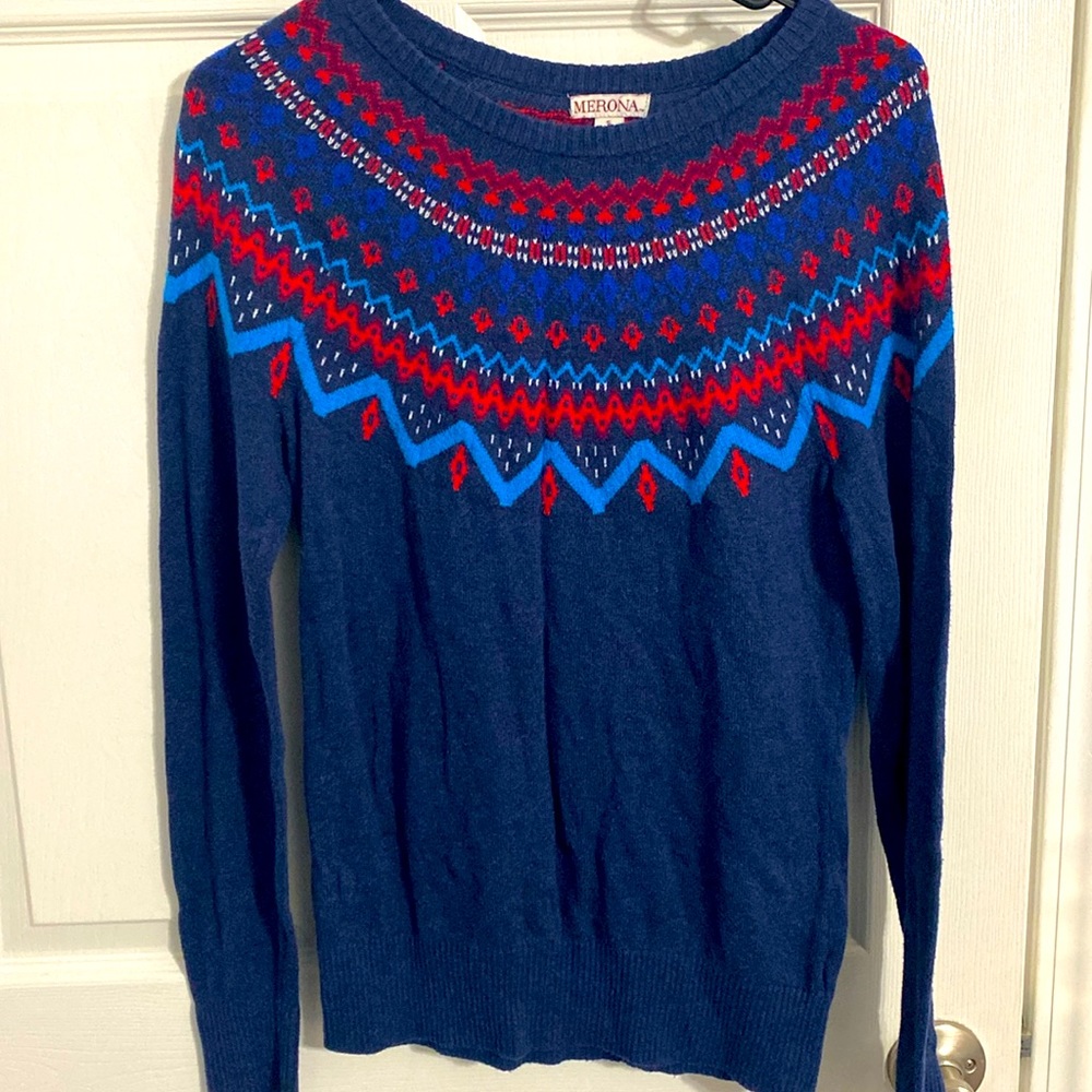 Small sweater. Even thought it’s small, it can fit a medium sized person